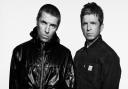 Liam and Noel Gallagher, who will return with Oasis in 2025.