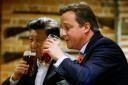 David Cameron drinks a pint with Chinese President Xi Jinping during his 2015 state visit (Kirsty Wigglesworth/PA)