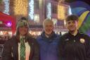 HannahRugg, Chris Lockyear, Leo Gribble switch on lights.