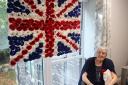 Pat Hansford, whose Union Jack flag made of knitted poppies will go on display at Brendoncare St Giles View care home in Winchester during Remembrance week.