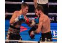 Dean Dodge and Danny Carr in action during their Southern Area super-featherweight title fight at Bolton Whites Hotel last February.