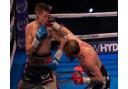 Dean Dodge and Danny Carr in action during their Southern Area super-featherweight title fight at Bolton Whites Hotel.