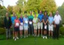 Jeff Bulcock holding the Yonex Trophy along with other prize winners following this week's Yonex Open at Wedmore.