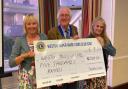 Weston Lions present two charities with £10,000 donation