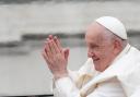 Pope Francis waves as he leaves after his weekly general audience in St Peter’s Square at The Vatican (Gregorio Borgia/AP)