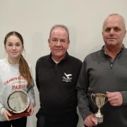 Club Captain Gordon Wheelaghan flanked by Sunday’s winners Paul and Isla Jones.