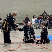 Students with one of the masters at the event in Norwich