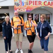 Fundraising Chair Denise Gocher, Royston Elmes, Lisa Smith, and Burnham Fundraising Treasurer Jan Pearce at Burnham Pavilion.