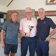 From left to right: Jason Eaton (Cadbury House), Richard Hughes (closest pin winner), and Dan Wilmot (brother of Mark Wilmot)