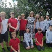 Mrs Hopkins with a group of pupils