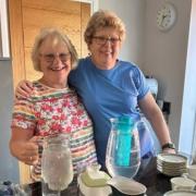 Angela and Sonia serving the afternoon tea during the charity's meeting