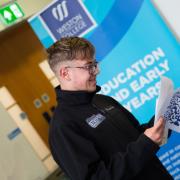 A Weston College student with his results