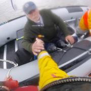 Allan being transferred to the RNLI inshore D Class lifeboat