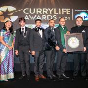 Coco Buffet team receiving award from host Camilla Tominey, Rushanara Ali MP (2nd from left), and Lord Bilimoria holding award