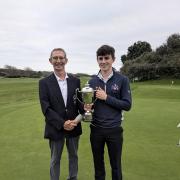 President John Whitewood awarded Charlie the prestigious trophy