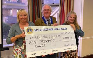 Weston Lions present two charities with £10,000 donation