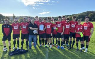 Dave Channing presents the September team of the month to Clevedon Utd A